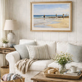 Painting of three figures fishing on a sunny beach, curved shoreline, calm blue ocean and wide open sky, calming coastal wall art